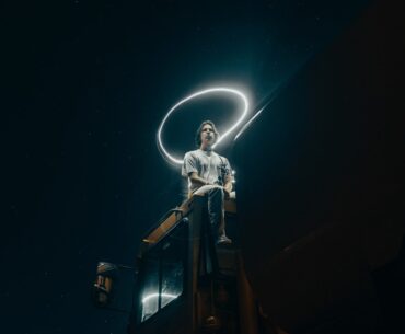 Man sitting with a halo effect on his head