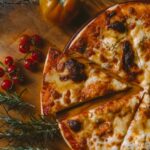 Domino's pizza slice separated from pizza to show digital transformation