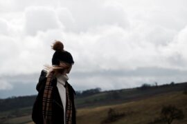 Woman looking into sea